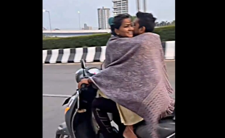 ವೀಡಿಯೋ: ದ್ವಿಚಕ್ರ ವಾಹನದ ಮೇಲೆ ಯುವ ಜೋಡಿಯ ರೊಮಾನ್ಸ್ – ಪೊಲೀಸರಿಂದ ಕೇಸ್ ದಾಖಲು